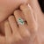 This contemporary bypass ring in featuring 0.72 carats two elegant pear-shaped emeralds, set in 14K white gold. Each stone...