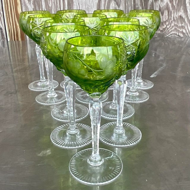 https://chairish-prod.freetls.fastly.net/image/product/sized/85e4eba5-7f85-4ebb-9b04-8d8fefab913a/vintage-regency-emerald-cut-crystal-wine-glasses-set-of-12-6225?aspect=fit&width=640&height=640