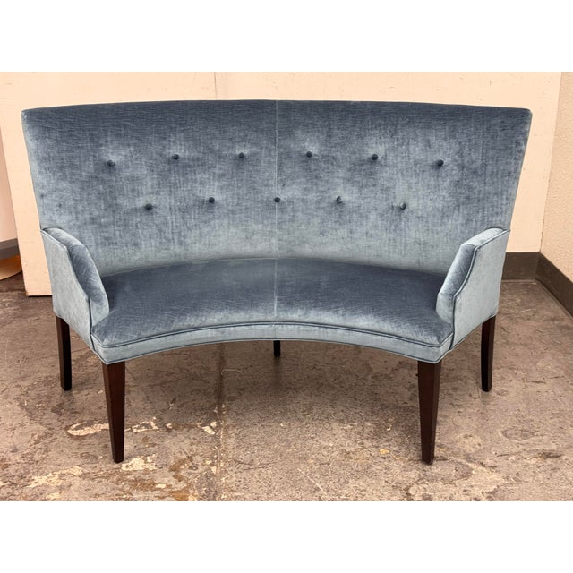 Design Plus Gallery presents a Bespoke Curved Settee. Upholstered in blue velvet with a softly contoured back and...