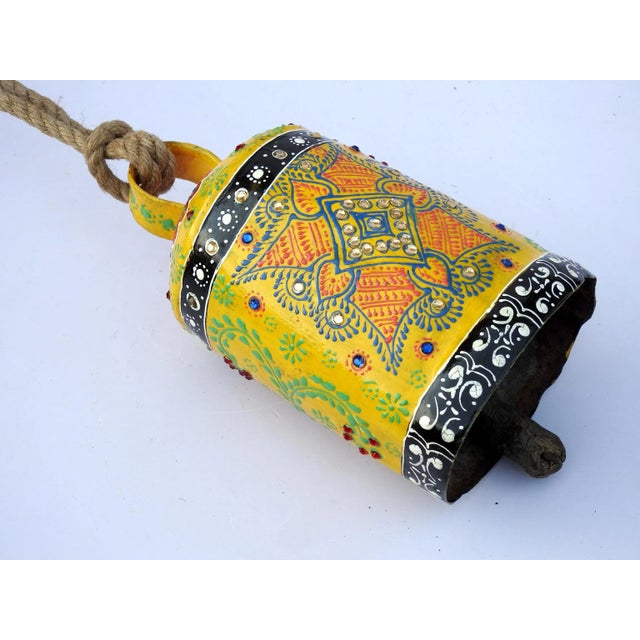 The bell is made of iron and coated primarily with copper, along with a few other metals. They are made from scrap iron...