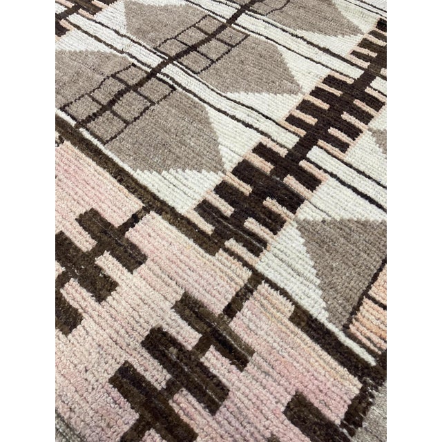 Introducing a stunning hand-knotted modern Moroccan wool rug in a sophisticated beige, showcasing an exquisite Art Deco...