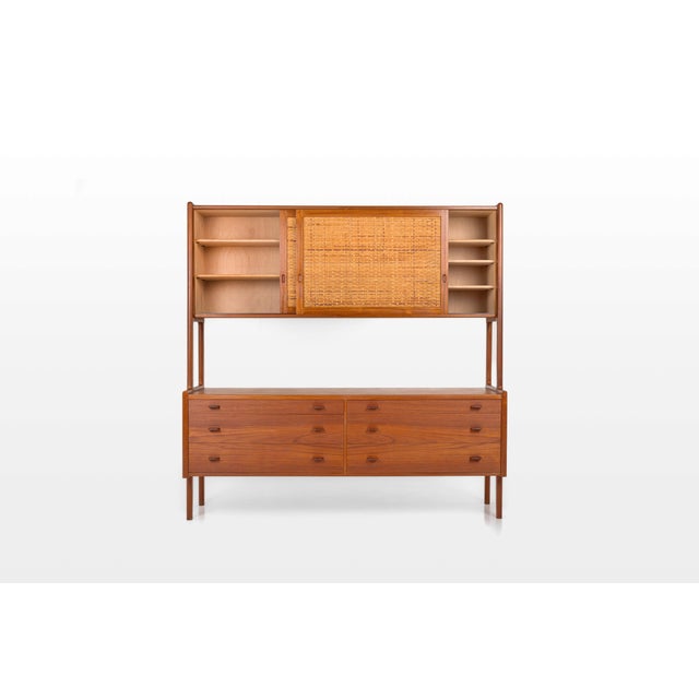 An exceptional teak double sideboard designed by hans j. Wegner in the 1950s and expertly crafted by ry møbler, one of...
