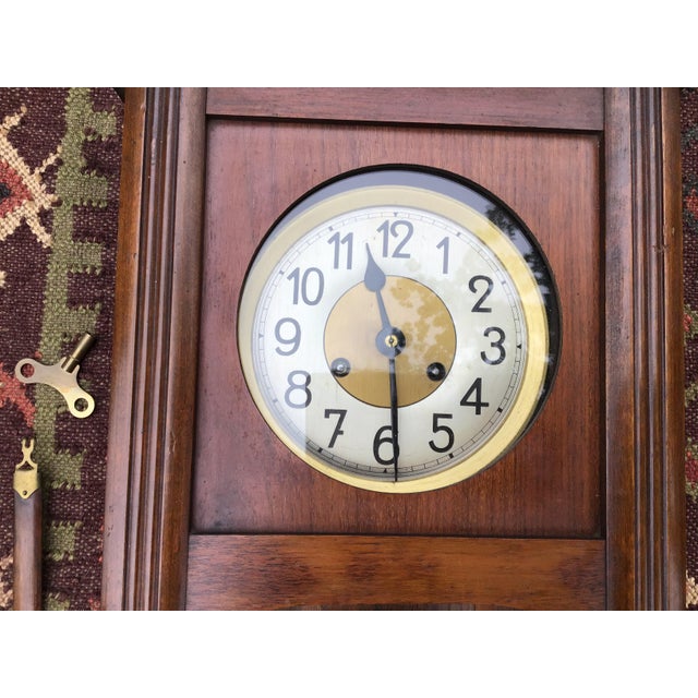 Vintage Mahogany and Brass Trimmed Grandfather Wall Clock Chairish