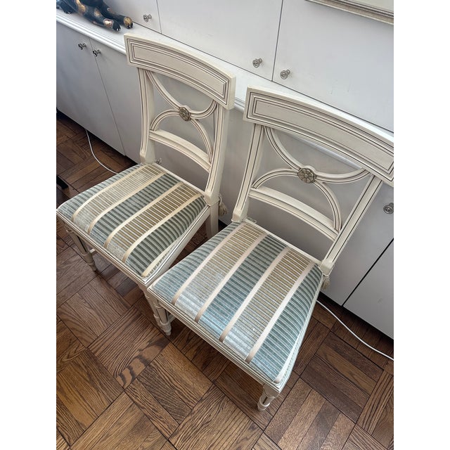 Hollywood Regency Two Bellman Chairs, White Lacquered With Gold Cilding, New Upholstered Seats and Chair Ties For Sale - Image 3 of 15