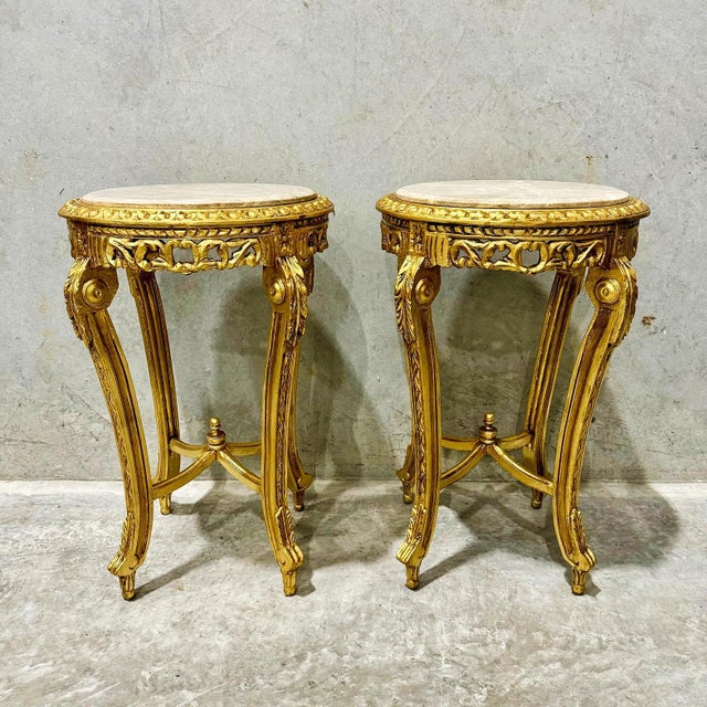 Fall in love with timeless elegance with this French-style side table. Featuring exquisite gold detailing and a...