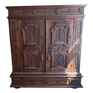 17th Century Baroque Carved Oak Cabinet with Foliate Relief & Wrought Iron For Sale