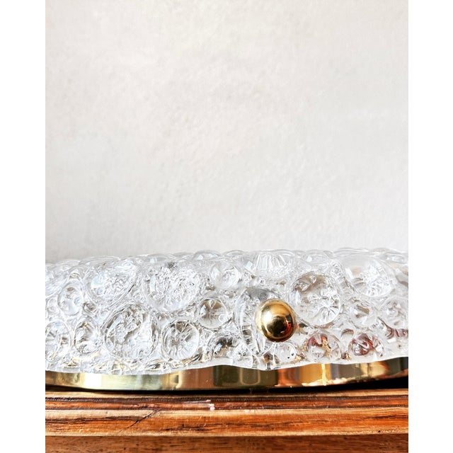 XXL 1970s Hillebrand round ceiling lamp, with ice-frosted bubble glass. Thick beautiful Murano glass shade which radiates...