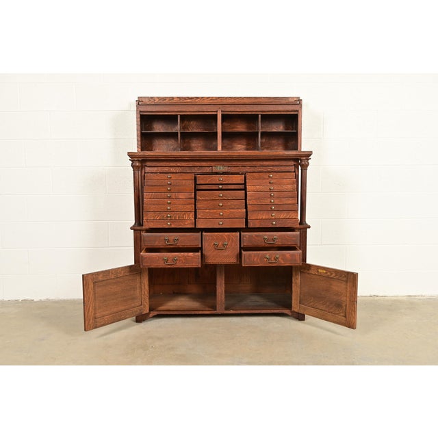 Early 21st Century Antique Arts & Crafts Oak 27-Drawer Tambour Door Dental Cabinet by American Cabinet Co., Circa 1900 For Sale - Image 5 of 18