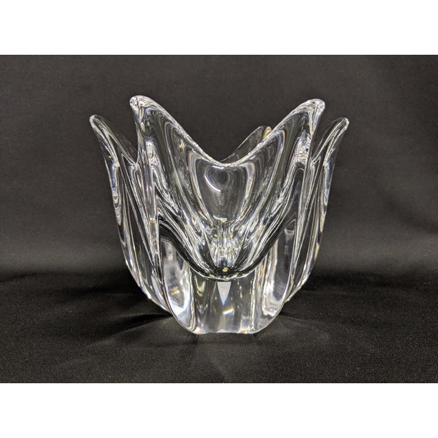 A large size Orrefors Belle bowl with the original label and etched marking. The large crystal bowl is in the shape of a...