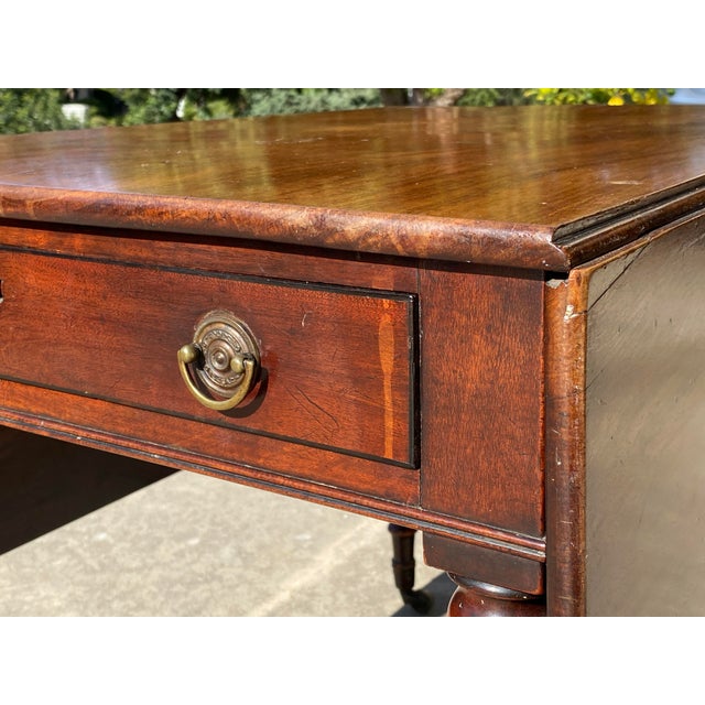 Own a Piece of History with This Stunning Antique Table! Discover the timeless beauty of this authentic antique Pembroke...