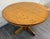 This is a vintage, possibly antique, solid oak round pedestal dining table featuring a classic Mission Arts and Crafts...
