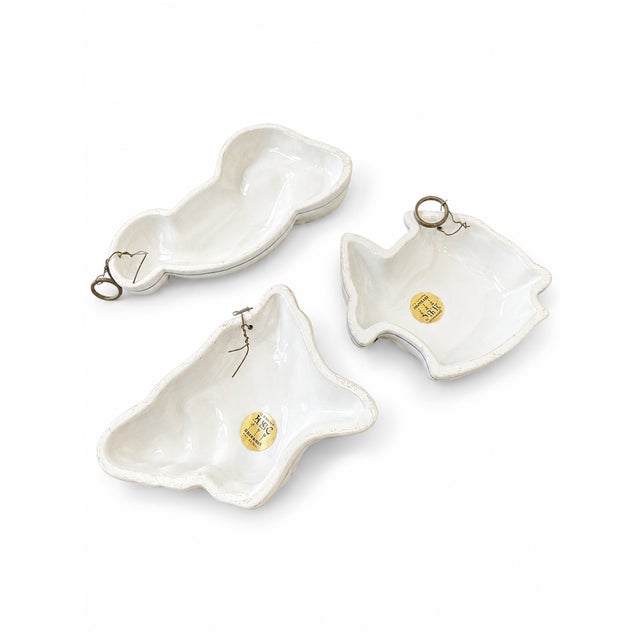 Bring a touch of whimsical Italian coastal charm to your walls with this delightful vintage set of three glazed ceramic...