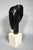 Amedeo Modigliani (1884-1920). Head of a Young Girl with Bangs. Bronze with brown patina, signed, lost-wax casting....