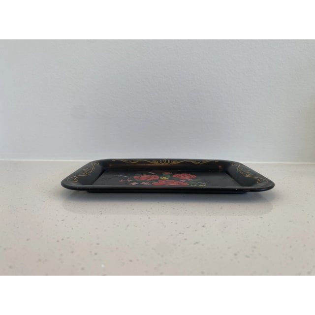 Petite vintage tole metal rectangular tray in black with vibrant red botanical theme