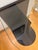 A contemporary Norah accent table by Los Angeles design studio Croft House, presented in a discontinued glass-top...
