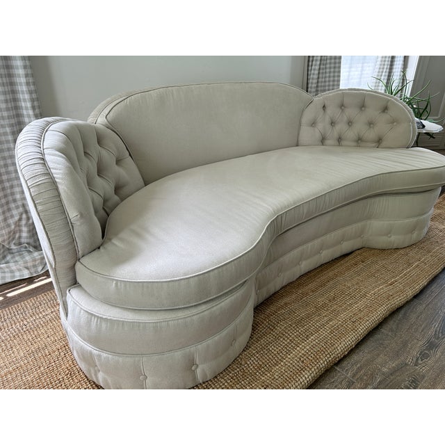 This is a fabulous vintage sofa that I had professionally reupholstered a few years ago. I also had a new seat cushion...