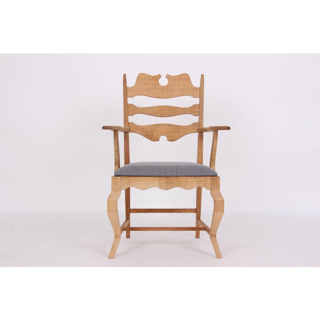 Armchair designed by Dane Henning Kjærnulf, 1960-1970, model Razor The seats are reupholstered in Kvadrat fabric, wool...