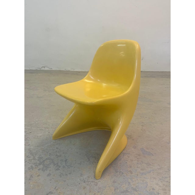 This yellow Casalino children's chair is an absolute design icon, bringing the cheerful, futuristic pop-art vibe of the...