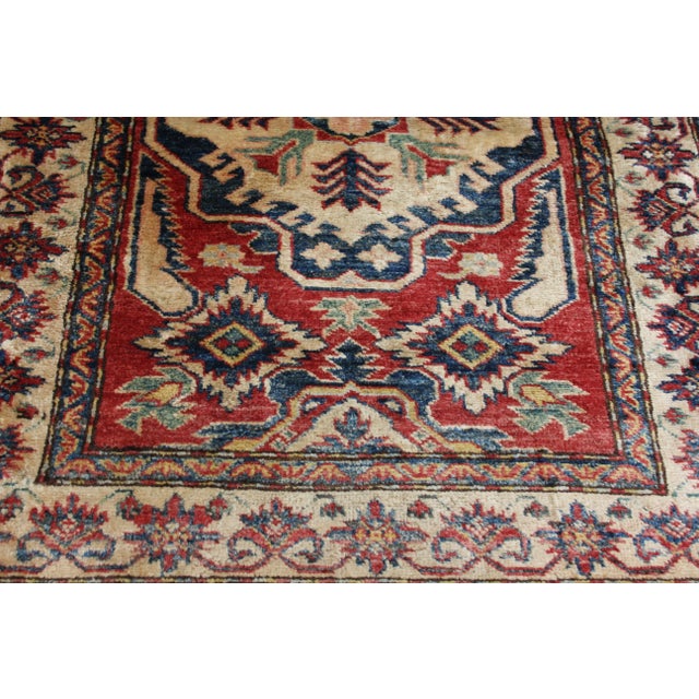 Vintage hand-knotted Persian rug with intricate medallion and border motifs. This beautiful accent ships within 1-2...