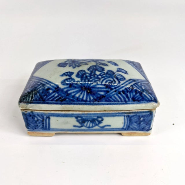 A beautiful blue and white porcelain box that was used as a scholar’s ink box. There has been minor restoration on the...