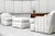 A luxurious pair of club chairs with an ottoman, designed by Sally Sirkin Lewis for J. Robert Scott, features oversized...