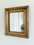A pair of antique Danish giltwood wall mirrors, dating to the late 19th to early 20th century. The rectangular wooden...