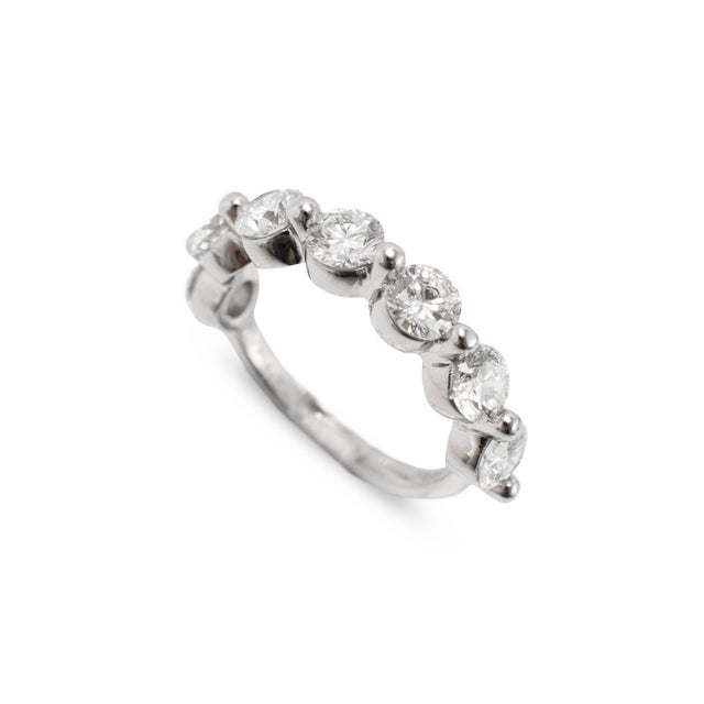 Gender: Ladies Metal Type: 900 Platinum Ring Size: 8 Width: 4.70 mm Weight: 7.93 grams Ladies 900 platinum seven-across,...