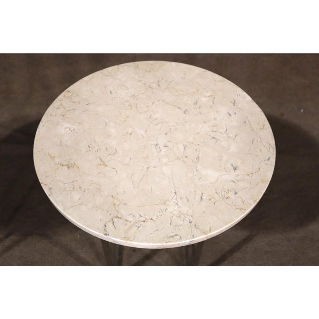 Pair of modern stone top tables with polished chrome bases. Add a pop of brightness to your room. Great to use as a...