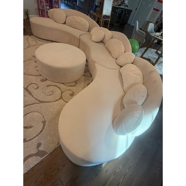 Hope you love this modern curved sectional sofa that can be divided into 3 separate sections, accompanied with a multi-use...