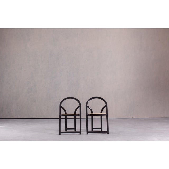 This set of two Arca folding chairs was designed by Gigi Sabadin for Crassevig and made in Italy in 1974. A distinctive...