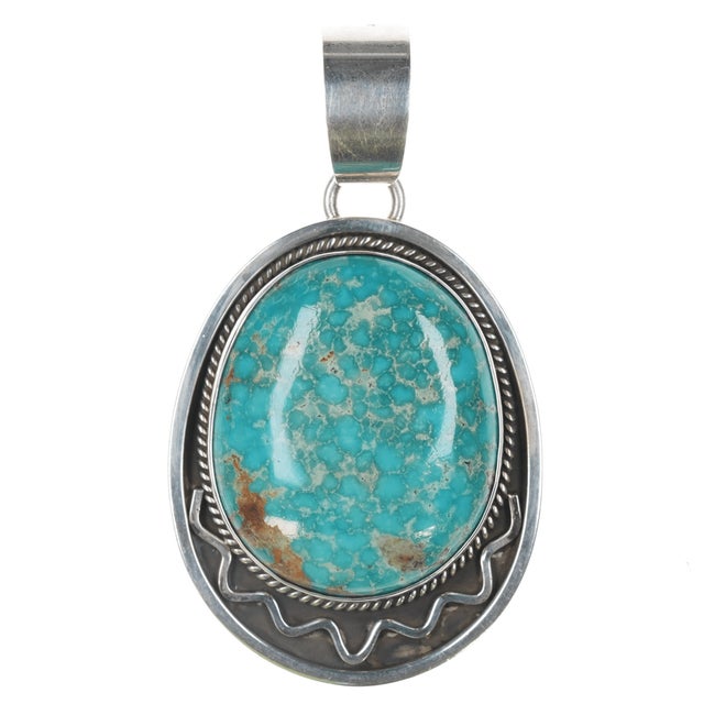 Large Daniel Coriz Santo Domingo high grade turquoise silver pendant. Weight and measurements in pics, can handle up to an...