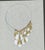 Original jewelry design drawing depicting an elaborate necklace with cascading pearl-like drops, coral-red bead accents...