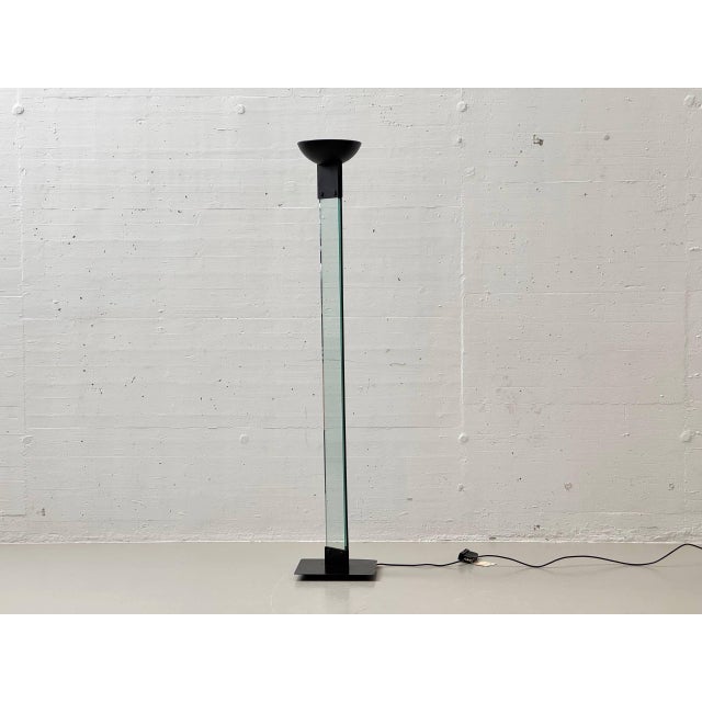 Sculptural floor lamp by italian designer max baguara, designed for lamperti in the 1980s. The lamp combines a strictly...