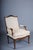 Stately French oak armchair in the Louis XV style. Solid wood, richly carved frame with curved legs and armrests. High,...