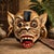 An expressive vintage Balinese monkey mask, hand carved from wood and individually painted in a warm palette of natural...