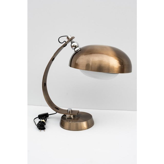Table lamp by arredo luce, made in italy, 1970s. Extraordinary bronzed brushed aluminum table lamp. Typical lamp from the...