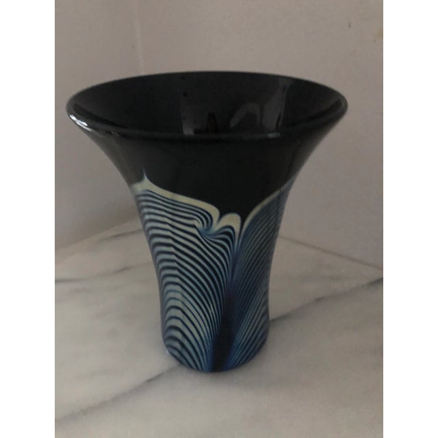 Stunning flared iridescent flared vase from Steven Correia, featured and on view at our nations great museums. This vase...