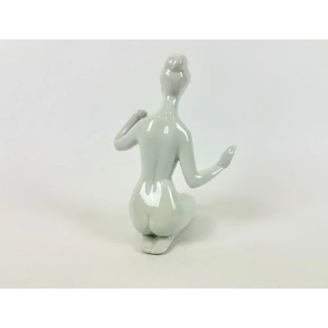 Woman Porcelain Figurine by Jiří Černoch for Royal Dux, 1960s, in Flawless conditions. Designed 1960 to 1969 This piece...