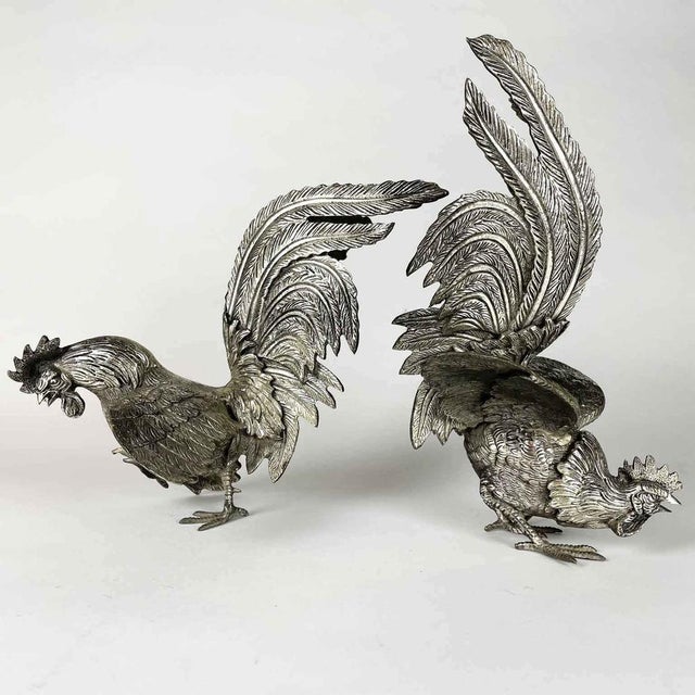 A pair of early 20th-century cast bronze roosters, cast in multiple parts and then assembled by welding, then chiseled and...