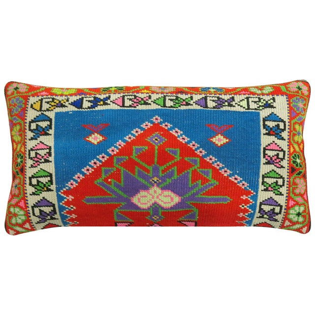 Large pillow made from a vintageTurkish Anatolian rug. 16'' x 33''