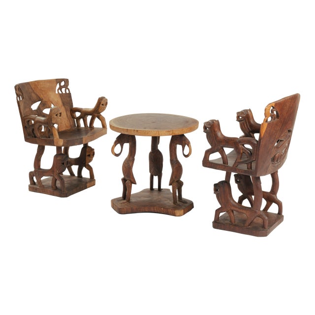 20th Century Fon Dignitary Monoxyl Carved Wood Armchairs and Table Set, Benin, 1954, Set of 3 For Sale