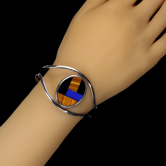 This is part of Chairish’s Fine Jewelry assortment. Unique Southwest Mosaic Sterling Silver Wire Cuff – Bold and Artistic...