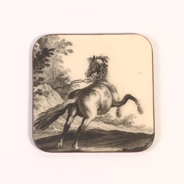 Incredibly charming set of six vintage horse coasters. Lacquered wood with red backs these unique coasters are a perfect...