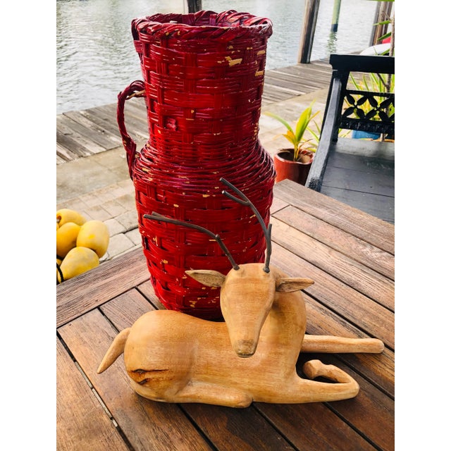 This is a unique vintage red wicker jar perfect with all the distressed vintage look and lost of color, for a pop of color...