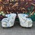 This pair of mid century floral armchairs have a nice shape and are a petite size. The fabric could use some cleaning up...