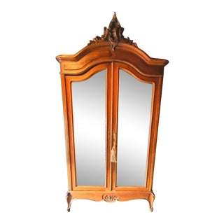 19th Century French Armoire With Mirrored Doors and Hand Carvings For Sale
