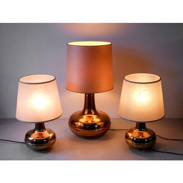Set of three bronze table lamps, italian design from the 70s. origin italy period 70s materials bronze, fabrics and...