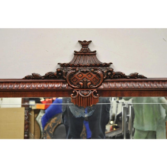 Vintage Chinese Chippendale Carved Mahogany Pagoda Frame Large Wall Mirror. Item features carved pagoda pediment, solid...