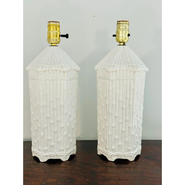 Straight out of an exquisite Sea Island, Ga. estate, a pair of white Italian ceramic lamps that are just wonderful. Think...