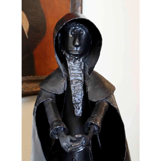 Beautifully crafted metal sculpture. Very special. At the bottom is a brass plate with a quote and signature: because the...